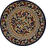 Terra Rossa - Multicoloured plate with floral design.